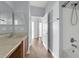 Bathroom featuring granite countertops, modern fixtures, and shower-tub combo at 10151 Chorlton Cir, Orlando, FL 32832