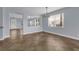 Elegant dining area with tile flooring, modern lighting, and a welcoming atmosphere at 10151 Chorlton Cir, Orlando, FL 32832