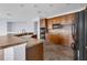 Well-equipped kitchen featuring ample cabinet space, modern appliances, and an island at 10151 Chorlton Cir, Orlando, FL 32832