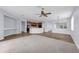 Spacious living room flowing into a kitchen, perfect for entertaining and everyday living at 10151 Chorlton Cir, Orlando, FL 32832
