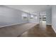 Open-concept living space with a neutral color scheme, ample natural light, and stylish finishes at 10151 Chorlton Cir, Orlando, FL 32832