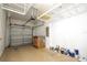 Attached garage with ceiling storage racks and finished walls at 11081 Savannah Landing Cir, Orlando, FL 32832