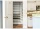 Walk-in pantry with adjustable wire shelving, conveniently located next to the kitchen at 11081 Savannah Landing Cir, Orlando, FL 32832