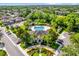 Aerial view of community amenities including a pool, lounge area, and well-maintained landscaping at 1122 Sandstone Run, Sanford, FL 32771