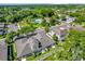 Aerial view of neighborhood amenities including a pool, playground, parking, and green spaces at 1122 Sandstone Run, Sanford, FL 32771