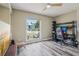 Cozy room featuring wood-look floors, lots of natural light and neutral walls at 12643 Lakebrook Dr, Orlando, FL 32828