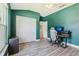 Office space with neutral walls, a large closet, and gray wood-look flooring at 12643 Lakebrook Dr, Orlando, FL 32828