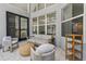Covered patio furnished with outdoor seating, offering a relaxing retreat at 12643 Lakebrook Dr, Orlando, FL 32828
