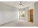 Bedroom with a ceiling fan, carpet flooring, natural light, and a closet for storage at 1275 Lake Shadow Cir # 13106, Maitland, FL 32751