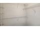 Walk-in closet with metal shelving and white walls for organizing belongings at 1275 Lake Shadow Cir # 13106, Maitland, FL 32751