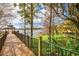 Picturesque gazebo by the lake offers tranquil retreat with stunning waterfront vistas and lush surroundings at 1275 Lake Shadow Cir # 13106, Maitland, FL 32751