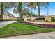 Attractive community signage, landscaping, and manicured lawn at 1275 Lake Shadow Cir # 13106, Maitland, FL 32751