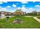 Community picnic area with a grill provides an outdoor dining option near the lake at 1275 Lake Shadow Cir # 13106, Maitland, FL 32751