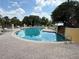 Enjoy the community pool, featuring sparkling water and lounge chairs for relaxation at 1275 Lake Shadow Cir # 13106, Maitland, FL 32751