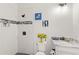 Modern bathroom features a tiled shower, granite vanity, and stylish decor at 13023 Sweet Hill Rd, Polk City, FL 33868