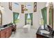 Luxury bathroom with a soaking tub, granite countertops, and scenic views at 13023 Sweet Hill Rd, Polk City, FL 33868