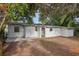 Backyard view showing the house exterior at 1320 E Lombardy Dr, Deltona, FL 32725