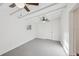 Bright bedroom featuring white walls, ceiling fan and a window at 1320 E Lombardy Dr, Deltona, FL 32725