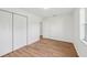 Bright bedroom with wood flooring and closet at 1320 E Lombardy Dr, Deltona, FL 32725