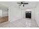 Living area with tile flooring and ceiling fan at 1320 E Lombardy Dr, Deltona, FL 32725