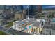 Aerial view showcases a residential building with a pool, cabana, framed, and urban cityscape backdrop at 151 E Washington St # 424, Orlando, FL 32801