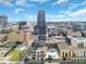 Aerial view of building and pool area, surrounded by downtown Orlando's skyline at 151 E Washington St # 424, Orlando, FL 32801