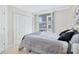 Bright bedroom with large window, natural light, and closet space at 151 E Washington St # 424, Orlando, FL 32801