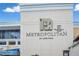 Building sign showing the name Metropolitan at Lake Eola and the address 151 East Washington Street at 151 E Washington St # 424, Orlando, FL 32801