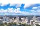 Expansive aerial view of the downtown skyline, showcasing a variety of buildings and rooftops at 151 E Washington St # 424, Orlando, FL 32801
