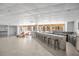 Inviting common area with a long bar, seating, and large windows at 151 E Washington St # 424, Orlando, FL 32801
