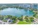 Scenic aerial view of a building with a lake backdrop and surrounding cityscape at 151 E Washington St # 424, Orlando, FL 32801