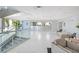 Welcoming lobby area featuring stairs with glass railings, tile floors, and comfortable seating at 151 E Washington St # 424, Orlando, FL 32801