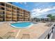 Enjoy abundant seating at this community's outdoor pool and bar area at 151 E Washington St # 424, Orlando, FL 32801