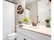 Stylish bathroom featuring a vanity and a shower with a white curtain at 15787 Tangerine Dream Ct, Winter Garden, FL 34787