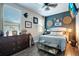 Inviting bedroom with decor and a queen-size bed at 15787 Tangerine Dream Ct, Winter Garden, FL 34787