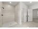 Modern bathroom with a fully tiled shower, a white toilet and a bright interior at 17445 Sw 41St Cir, Ocala, FL 34473