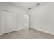 Neutral bedroom featuring light wood-look floors and closet at 17445 Sw 41St Cir, Ocala, FL 34473