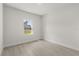 Bedroom featuring light wood-look floors and a bright window view at 17445 Sw 41St Cir, Ocala, FL 34473