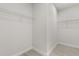 Walk-in closet with wire shelving and light wood-look floors at 17445 Sw 41St Cir, Ocala, FL 34473