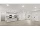 Modern kitchen with white cabinetry, stainless steel appliances, and an open layout at 17445 Sw 41St Cir, Ocala, FL 34473