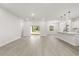 Bright and open living space with modern flooring and plenty of natural light at 17445 Sw 41St Cir, Ocala, FL 34473