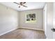 Cozy bedroom with laminate flooring and a ceiling fan at 214 S Cottage Hill Rd, Orlando, FL 32805