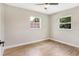 Light-filled bedroom with laminate flooring and ample natural light at 214 S Cottage Hill Rd, Orlando, FL 32805