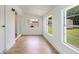 Bright bonus room with many windows and laminate floors at 214 S Cottage Hill Rd, Orlando, FL 32805