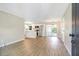 Open-concept living room and kitchen area with sleek appliances at 214 S Cottage Hill Rd, Orlando, FL 32805