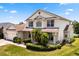 Charming two-story home with manicured landscaping and welcoming curb appeal in a well-maintained neighborhood at 2512 Chapala Dr, Kissimmee, FL 34746