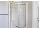 This bathroom features a shower with sliding doors and a shower head at 28 N Osceola Ave, Center Hill, FL 33514