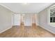 Bright bedroom with ensuite bathroom and walk in closet at 28 N Osceola Ave, Center Hill, FL 33514