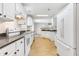 Well-lit kitchen with a breakfast bar and modern appliances, perfect for everyday living at 28 N Osceola Ave, Center Hill, FL 33514