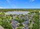 Beautiful aerial view of a lakeside community featuring lush landscaping and stunning views at 305 West Lake Faith Dr # 139, Maitland, FL 32751